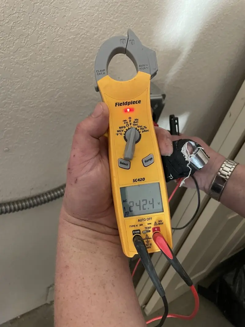 Voltage testing with clamp meter during Hot Tub / Pool Electrical Wiring in White City